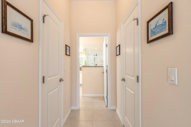 hallway featuring light tile patterned flooring