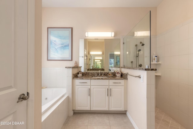 bathroom with vanity, tile patterned floors, and separate shower and tub