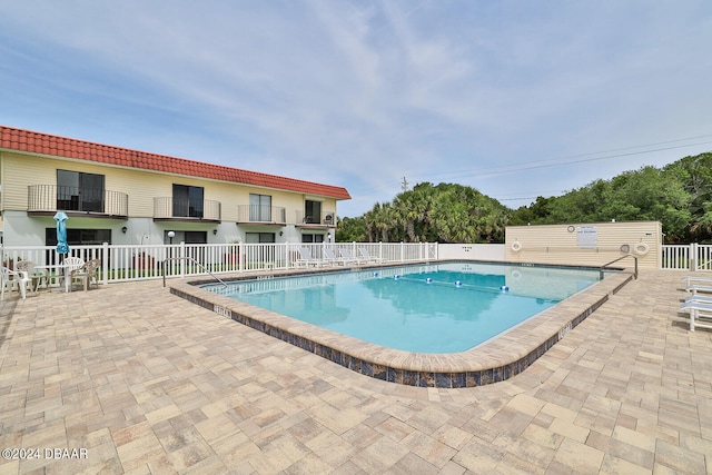 view of pool with a patio