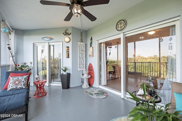 sunroom / solarium with ceiling fan