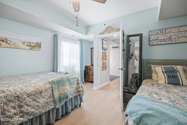 bedroom featuring light hardwood / wood-style floors and ceiling fan