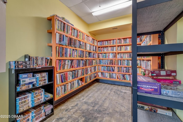 2800 N Atlantic Ave Unit 501, Daytona Beach, FL 32118 - miscellaneous room with wall of books