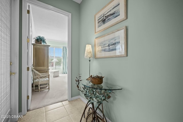 hallway with light tile patterned floors