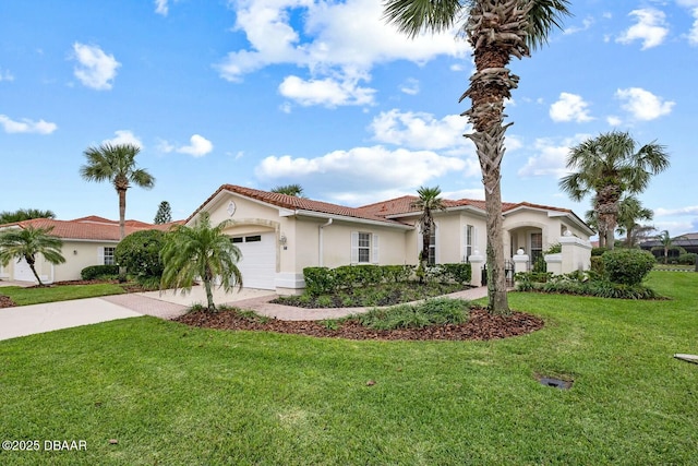 mediterranean / spanish-style home with a front lawn and a garage