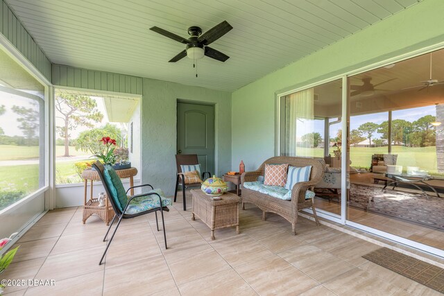 6273 Paradise Island Ct, Port Orange, FL 32128 - sunroom / solarium featuring a ceiling fan and an outdoor living space