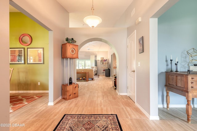 6273 Paradise Island Ct, Port Orange, FL 32128 - corridor featuring arched walkways and baseboards