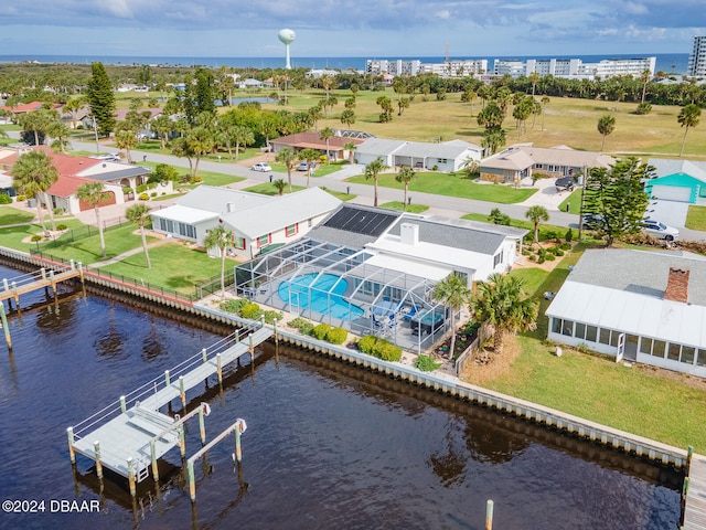 drone / aerial view featuring a water view