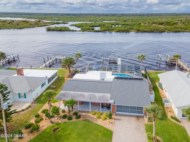 birds eye view of property featuring a water view