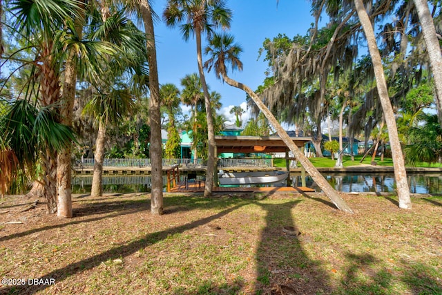 22 Cedar St, Port Orange, FL 32127 - view of green lawn with a water view
