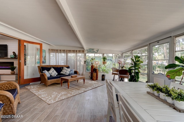 22 Cedar St, Port Orange, FL 32127 - sunroom with wood finished floors and a wooden deck