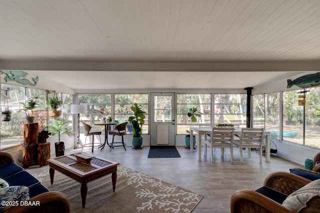 22 Cedar St, Port Orange, FL 32127 - sunroom / solarium with wooden ceiling, wood finished floors, and beam ceiling