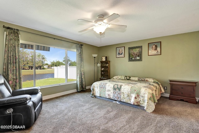 5479 Saint Regis Way, Port Orange, FL 32128 - carpeted bedroom featuring a water view and ceiling fan