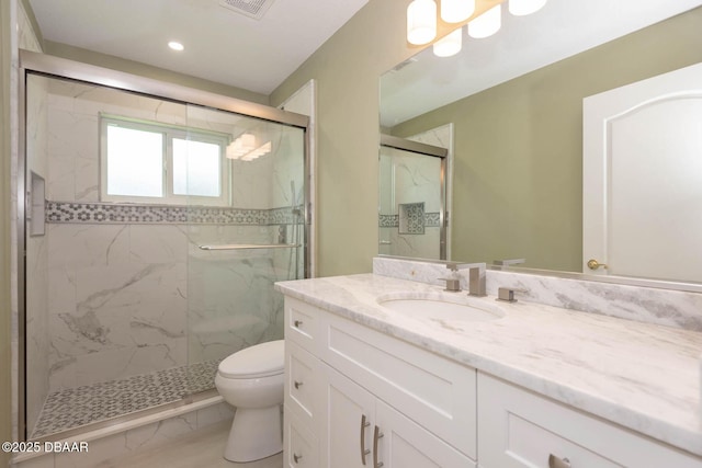 5479 Saint Regis Way, Port Orange, FL 32128 - bathroom with marble finish flooring, a marble finish shower, vanity, and recessed lighting