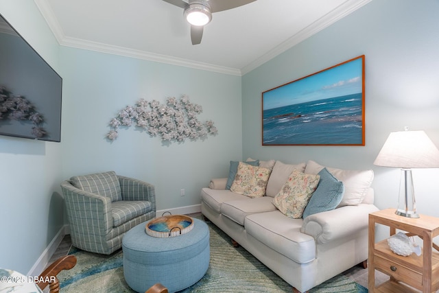 living room featuring hardwood / wood-style flooring, ornamental molding, and ceiling fan