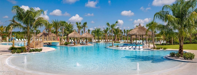 view of pool featuring a gazebo and pool water feature