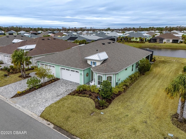 drone / aerial view featuring a water view