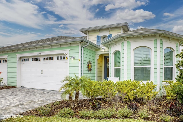 view of front of home with a garage