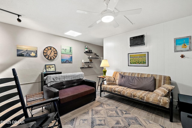 42 N Ocean Palm Villa, Flagler Beach, FL 32136 - living room with ceiling fan, track lighting, and a wall unit AC