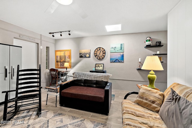 42 N Ocean Palm Villa, Flagler Beach, FL 32136 - living room with rail lighting and ceiling fan