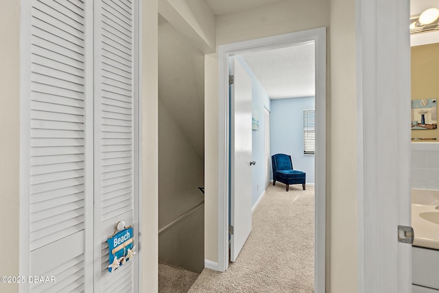 42 N Ocean Palm Villa, Flagler Beach, FL 32136 - hall with light carpet and a textured ceiling