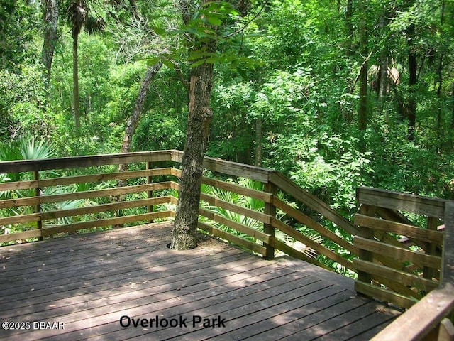 deck with a forest view