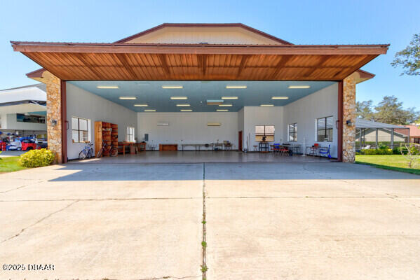 exterior space with concrete driveway