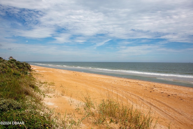 property view of water featuring a beach view