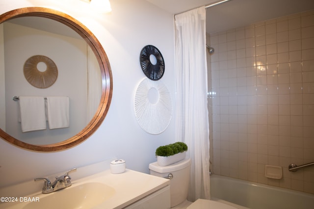 full bathroom featuring vanity, toilet, and shower / tub combo