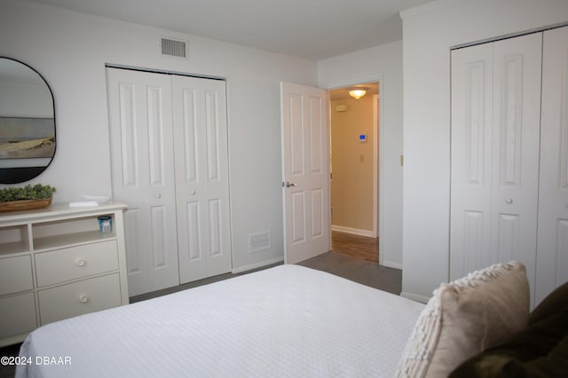 bedroom featuring two closets