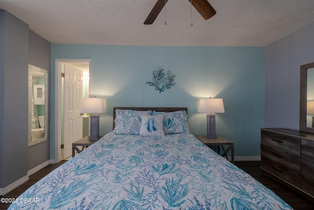 935 S Atlantic Ave Unit 509, Daytona Beach, FL 32118 - bedroom featuring baseboards, a ceiling fan, and dark wood-style flooring