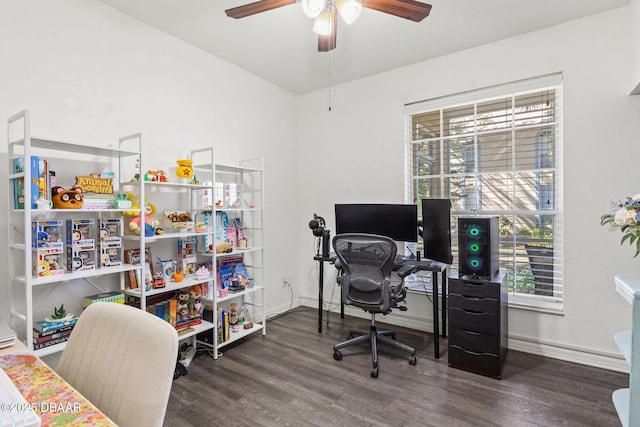 office area featuring a ceiling fan, baseboards, and wood finished floors