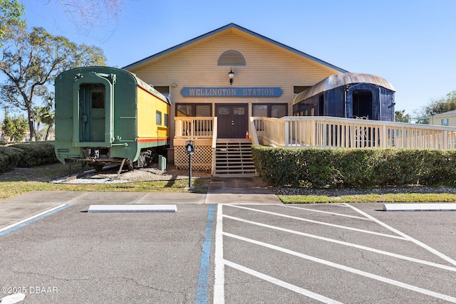 view of front of home with uncovered parking