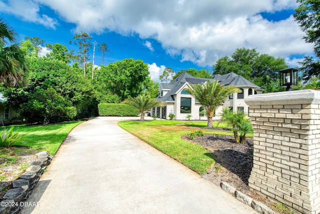 view of front of home with a front yard