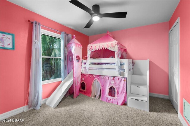 bedroom with carpet flooring, ceiling fan, and baseboards