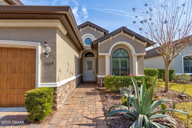 entrance to property with a garage