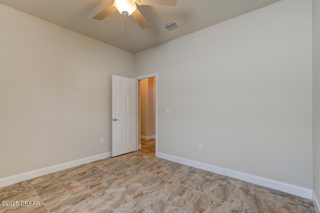 empty room featuring ceiling fan