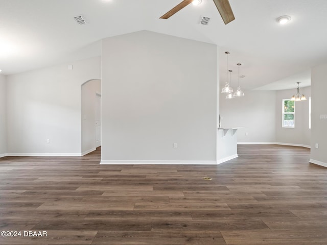 unfurnished living room with dark wood-type flooring, ceiling fan, and lofted ceiling