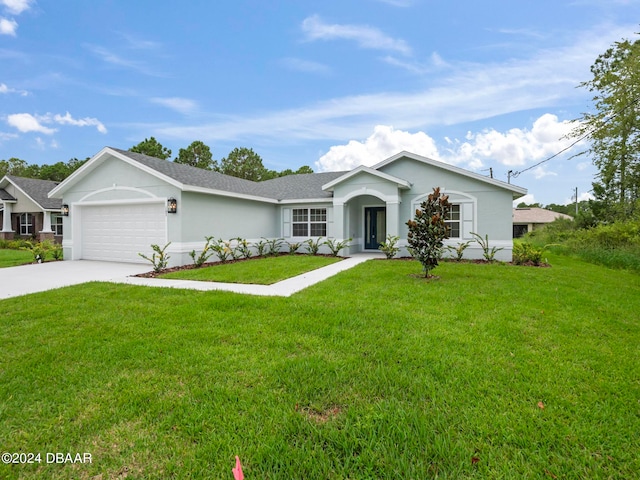 ranch-style house with a front lawn and a garage