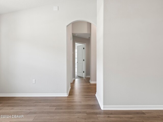 hallway featuring hardwood / wood-style flooring