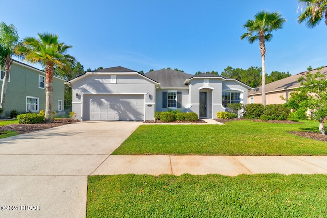 view of front of home featuring a garage and a front lawn