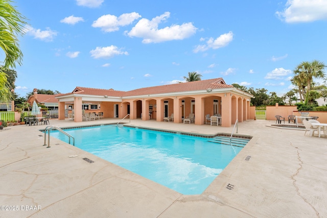 view of pool featuring a patio area