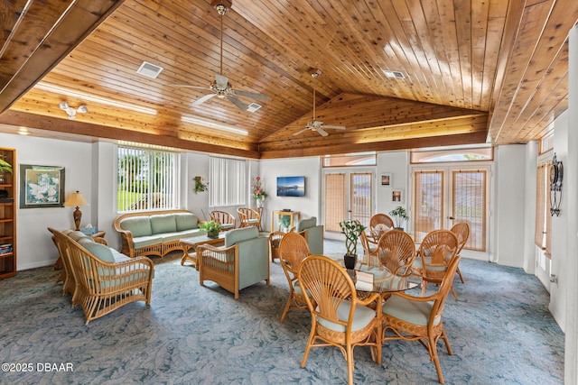 dining room featuring high vaulted ceiling, french doors, carpet flooring, ceiling fan, and wood ceiling