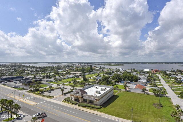 birds eye view of property featuring a water view