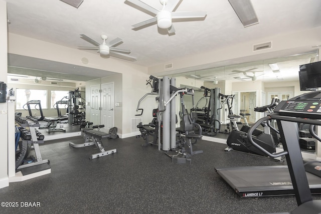 exercise room featuring ceiling fan