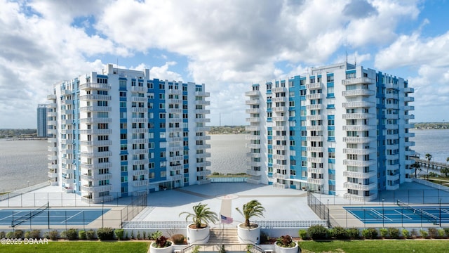 view of property with a water view