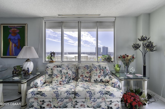 bedroom featuring multiple windows and a textured ceiling