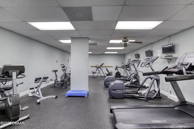 workout area with a paneled ceiling