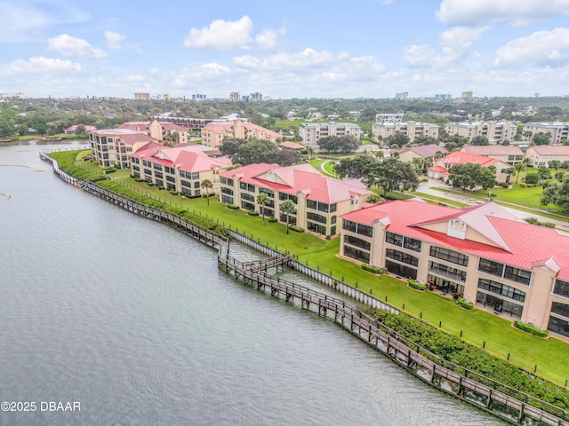 birds eye view of property featuring a water view