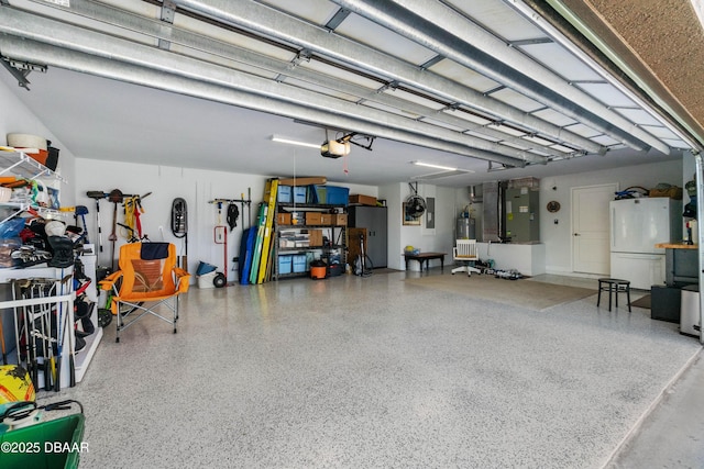 garage featuring heating unit, a garage door opener, water heater, and white refrigerator