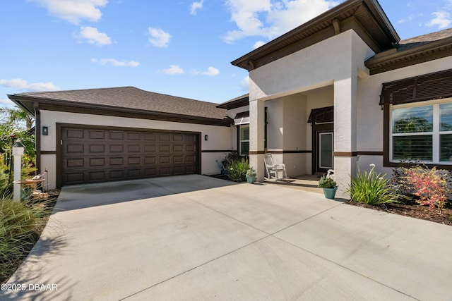 view of front of home with a garage